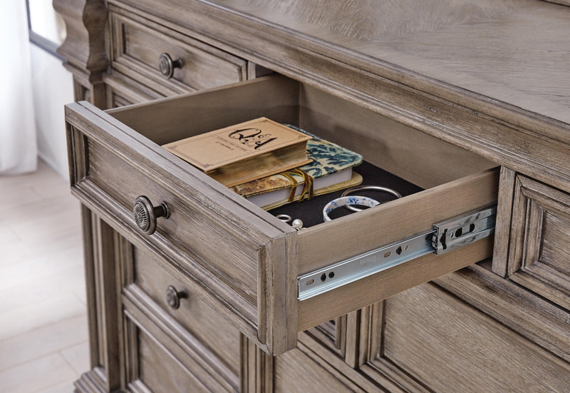 Close-up of the Ashley Furniture Blairhurst Dresser showcasing its wood finish, detailed drawer handles, and elegant design.