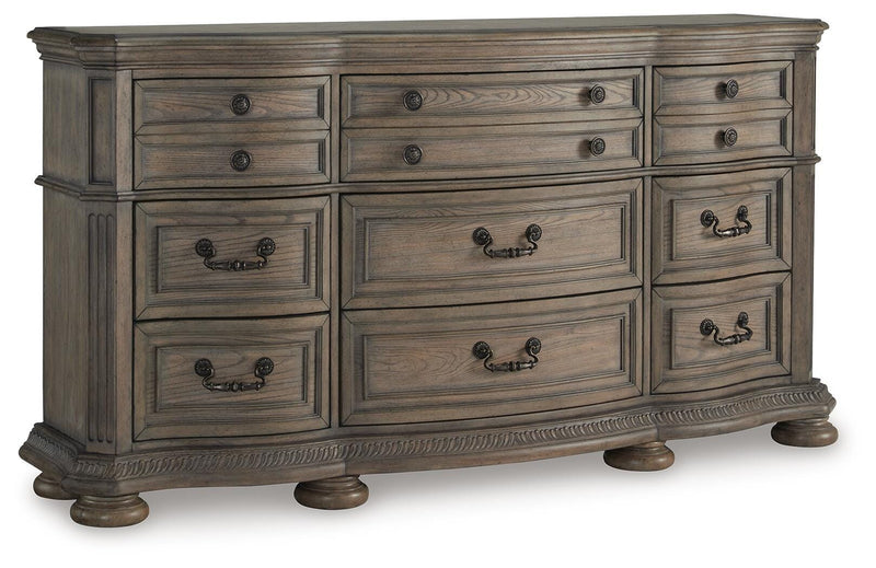 Ashley Furniture Ardenfield Dresser with closed drawers, showcasing a sleek wood finish and modern design from an angled side view.