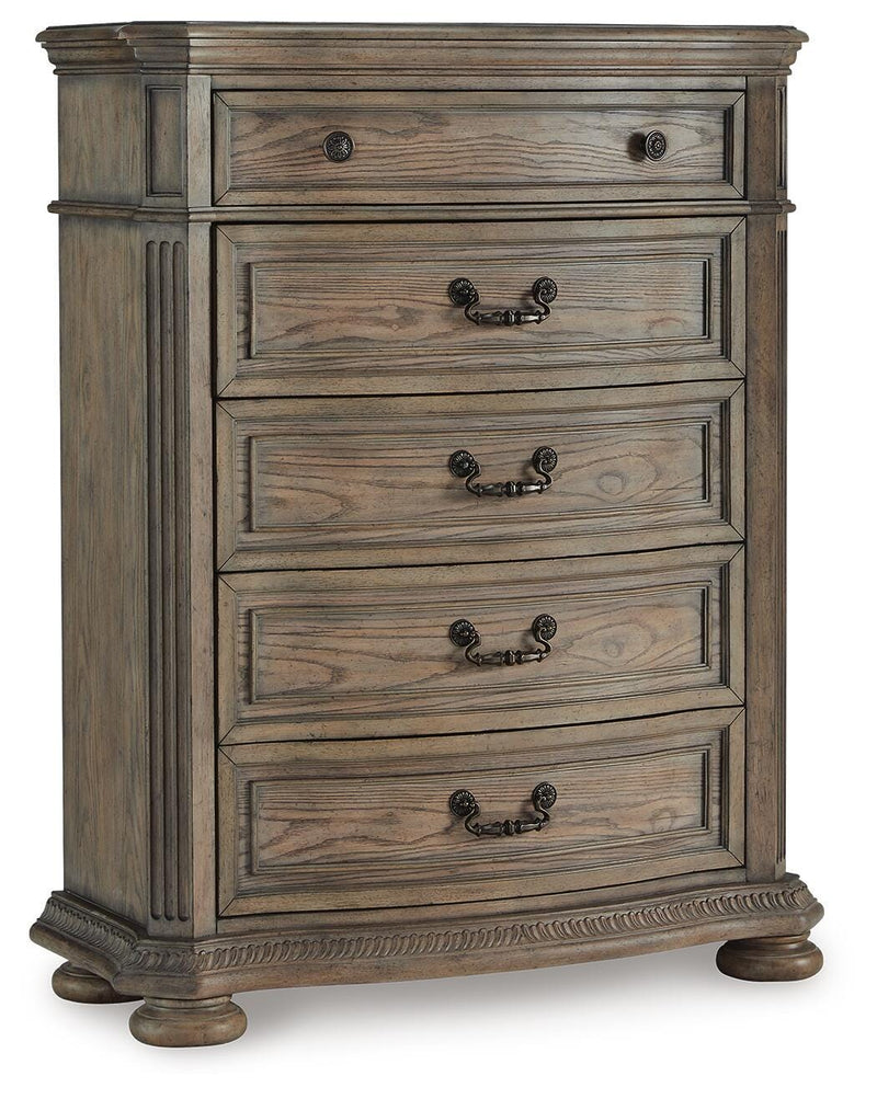 Ashley Furniture Ardenfield chest of drawers shown from an angled view, featuring a classic wood finish and multiple storage drawers.