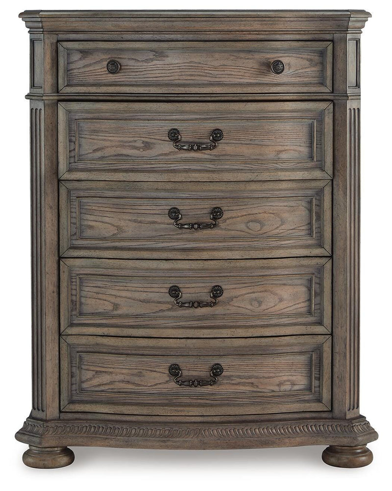 Ashley Furniture Ardenfield chest of drawers with a sleek wood finish and multiple storage drawers, head-on view.