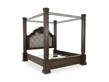 Ashley Furniture Maylee Bed with a stylish wooden frame and neutral fabric headboard, shown from an angled perspective.