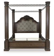 Ashley Furniture Maylee Bed showcasing a regal headboard with upholstered fabric and elegant design details.