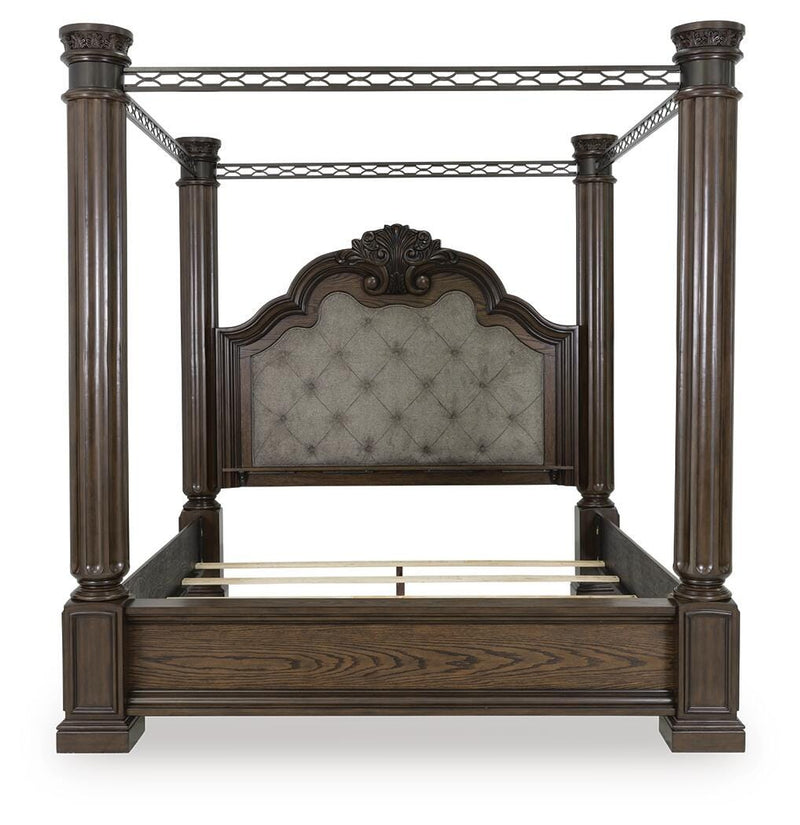 Ashley Furniture Maylee Bed showcasing a regal headboard with upholstered fabric and elegant design details.