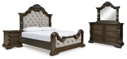 Ashley Furniture Maylee bedroom set including a bed frame, nightstands, and dresser with a modern design in a stylish bedroom.