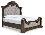 Ashley Furniture Maylee bedroom set with a stylish bed frame, nightstands, and dresser in a modern bedroom scene.