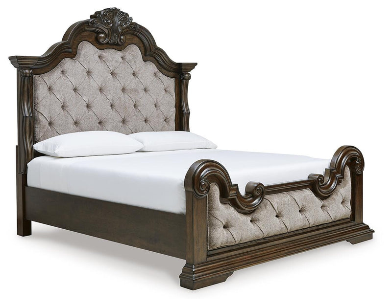 Ashley Furniture Maylee bedroom set with a stylish bed frame, nightstands, and dresser in a modern bedroom scene.