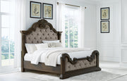 Ashley Furniture Maylee bedroom set with a bed, nightstands, and dresser in a modern, stylish bedroom arrangement.