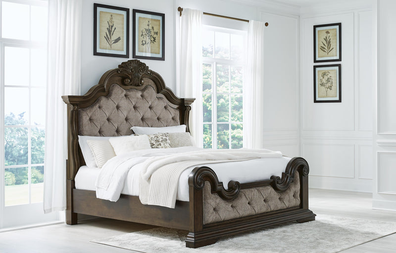 Ashley Furniture Maylee bedroom set with a bed, nightstands, and dresser in a modern, stylish bedroom arrangement.