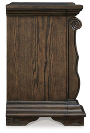 Ashley Furniture Maylee bedroom set with a bed frame, nightstands, and dresser in a modern design visible in the image.