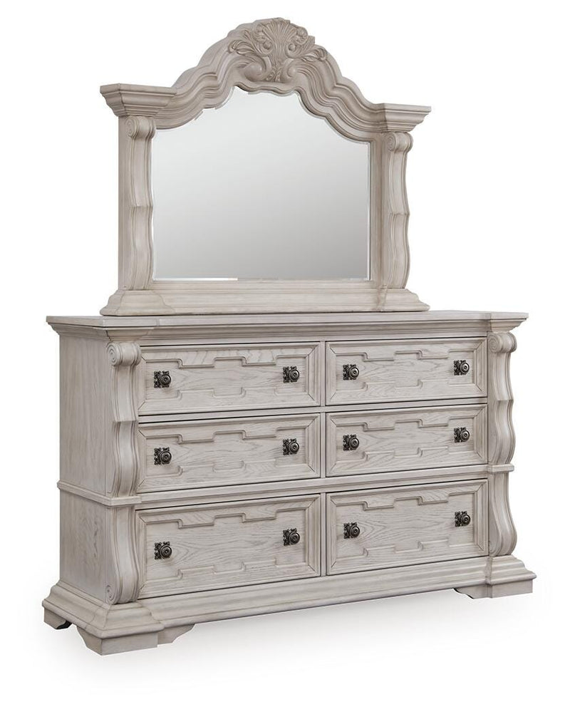 Ashley Furniture Bruchandi bedroom set with a modern bed frame, matching nightstands, and a stylish dresser in a cozy bedroom setting.