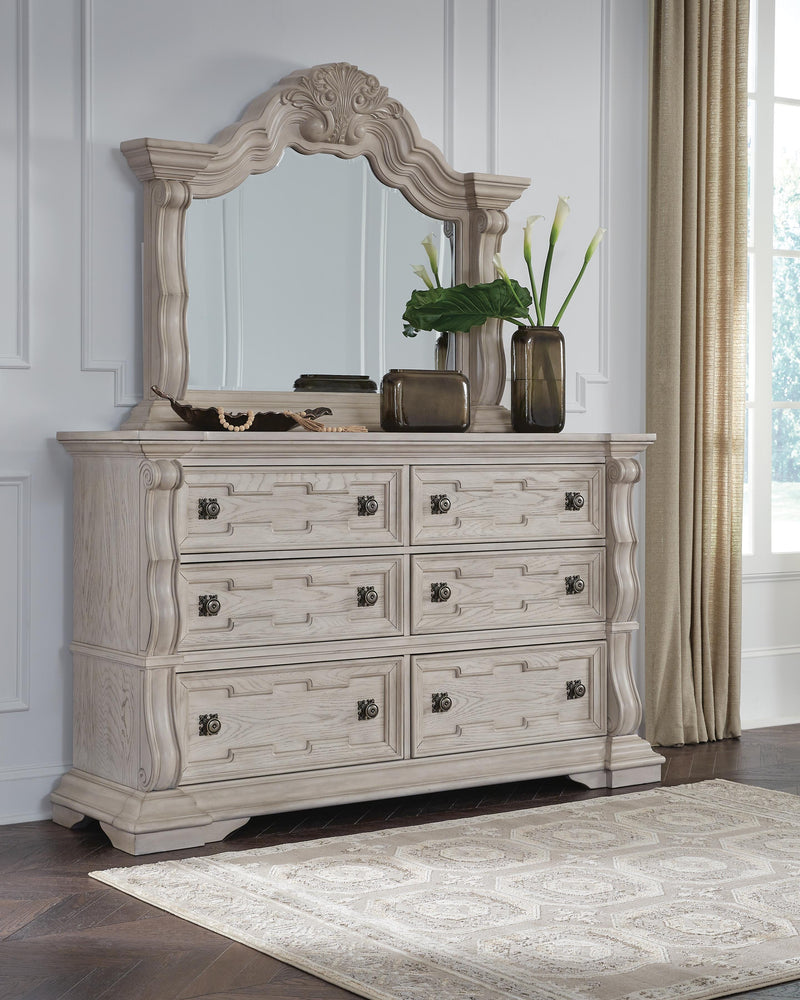 Ashley Furniture Bruchandi bedroom set featuring a bed, nightstands, and dresser in a modern, cohesive design.