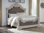 Ashley Furniture Bruchandi bedroom set with a bed, nightstands, and dresser in a modern, elegant bedroom layout.
