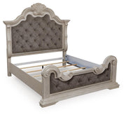 Ashley Furniture Bruchandi bedroom set featuring a bed frame, matching nightstands, and dresser in a modern bedroom design.