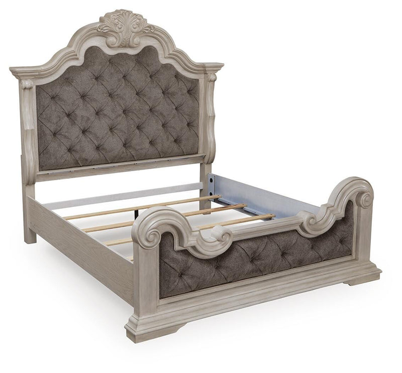 Ashley Furniture Bruchandi bedroom set featuring a bed frame, matching nightstands, and dresser in a modern bedroom design.