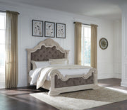 Ashley Furniture Bruchandi bedroom set featuring a stylish bed frame, matching nightstands, and coordinating dresser in a modern design.