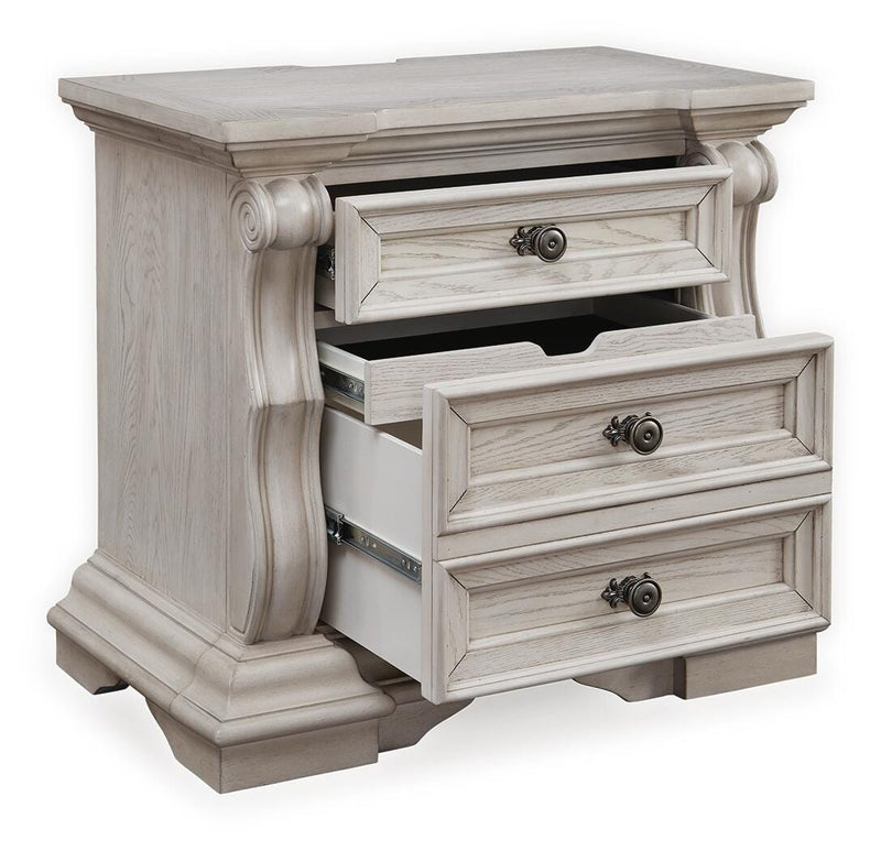 Ashley Furniture Bruchandi bedroom set with a bed, dresser, and nightstands, shown from an angled open view.