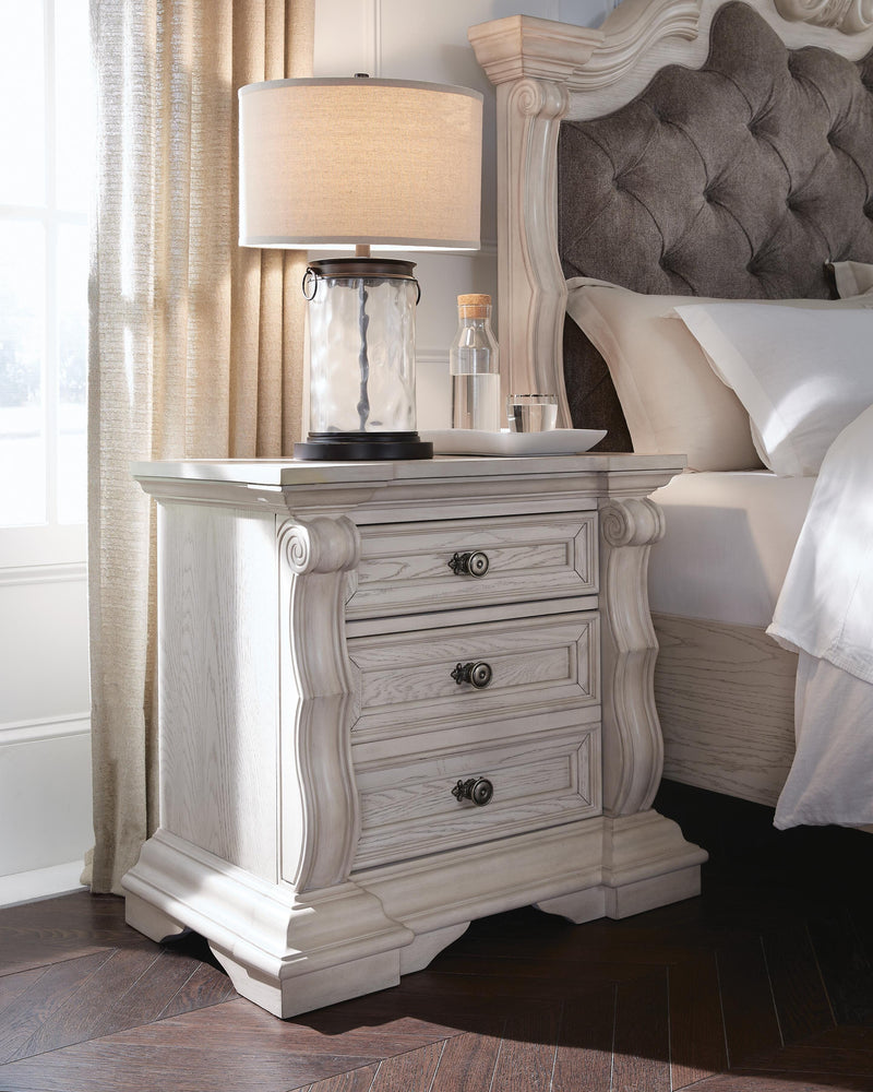 Ashley Furniture Bruchandi bedroom set featuring a bed frame, matching nightstands, and dresser with modern design.