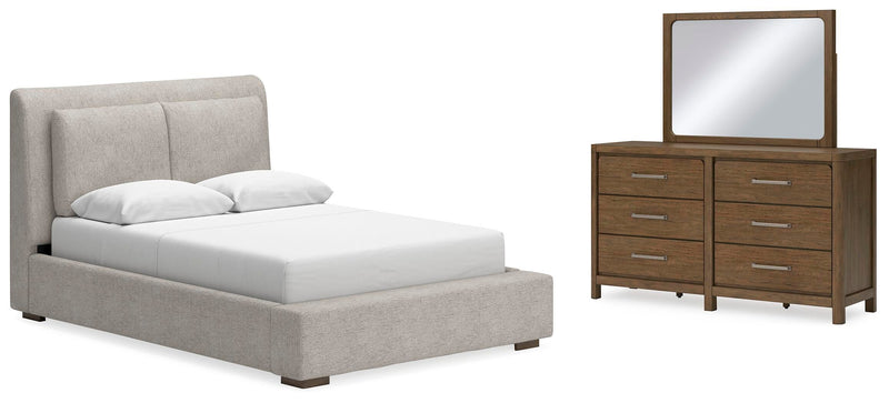 Ashley Furniture Cabalynn bedroom set with a modern bed frame, matching nightstands, and dresser in stylish finish.