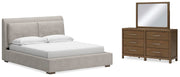 Ashley Furniture Cabalynn bedroom set featuring a bed frame, nightstands, and dresser in a modern bedroom design.