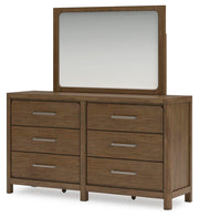 Ashley Furniture Cabalynn dresser and mirror set, featuring a sleek wood finish and modern design, shown from an angled view.