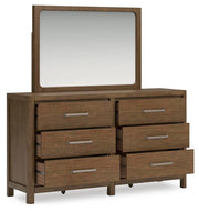 Ashley Furniture Cabalynn bedroom set featuring a bed frame, nightstands, and dresser in a stylish bedroom scene.
