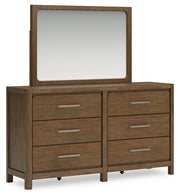 Ashley Furniture Cabalynn dresser and mirror set with sleek wood finish, featuring ample storage drawers and a matching rectangular mirror.