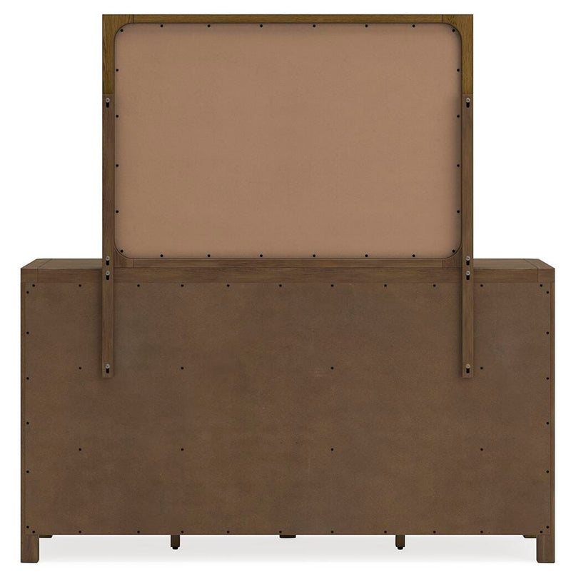 Cabalynn dresser with mirror by Ashley Furniture, featuring a wooden finish and classic design, shown from the back view.