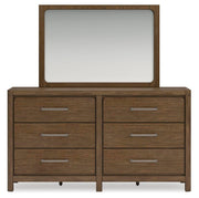 Ashley Furniture Cabalynn bedroom set featuring a bed with a upholstered headboard and matching bedroom furniture in a modern style.