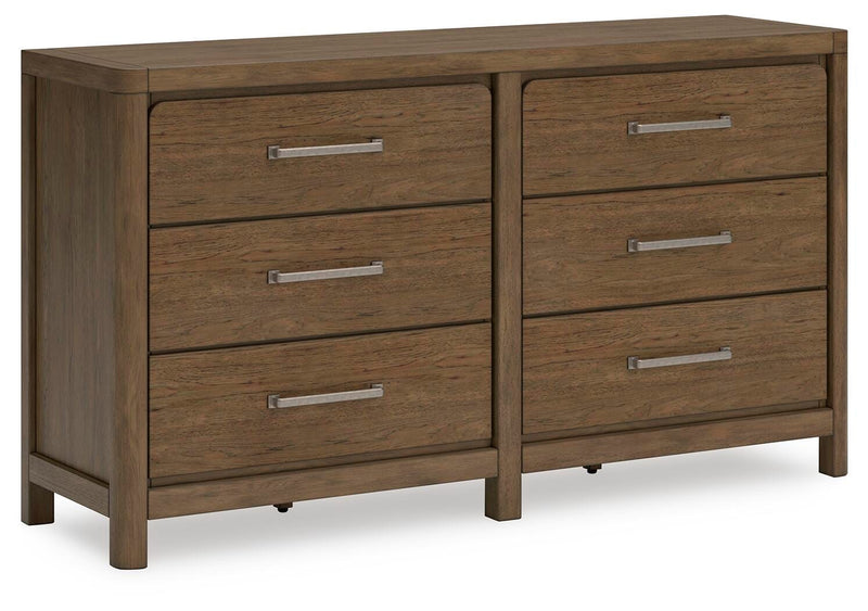 Ashley Furniture Cabalynn Dresser with multiple drawers, shown from an angled view highlighting its dark wood finish and modern design.