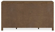 Cabalynn dresser by Ashley Furniture featuring a modern wooden design with multiple drawers and sleek hardware.