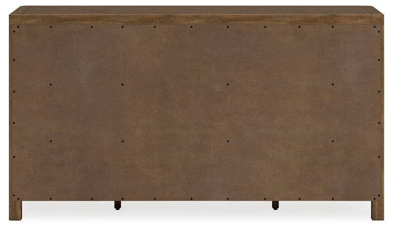 Cabalynn dresser by Ashley Furniture featuring a modern wooden design with multiple drawers and sleek hardware.