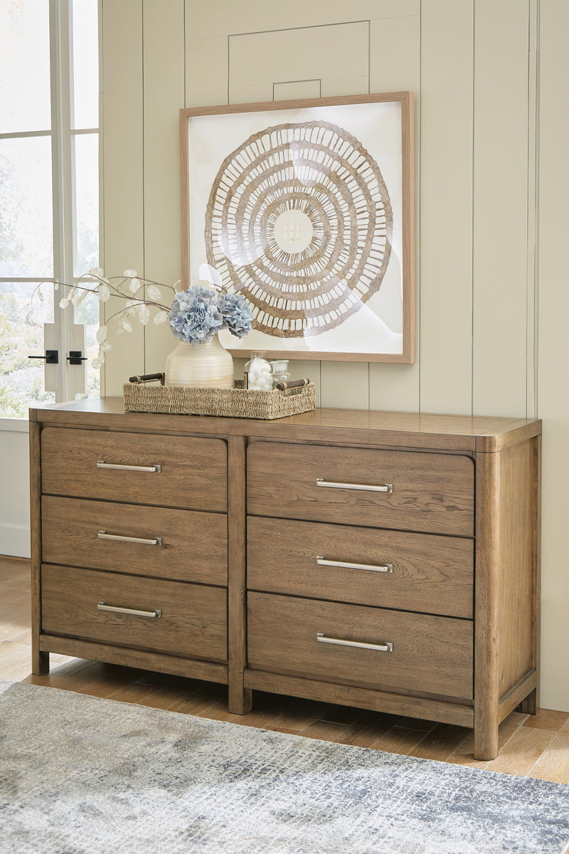 Ashley Furniture Cabalynn Dresser with multiple drawers, dark wood finish, and sleek modern design.