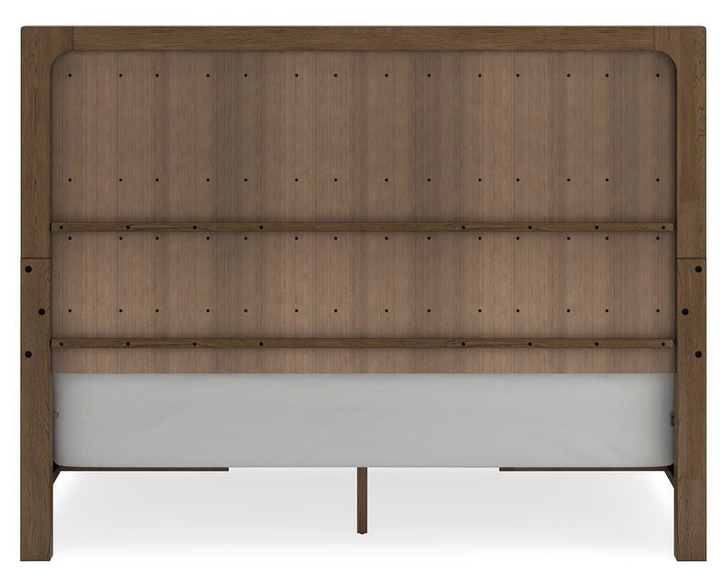 Ashley Furniture Cabalynn bed with storage featuring a sturdy frame and a comfortable upholstered headboard.