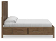 Ashley Furniture Cabalynn Bed with Storage, shown from side view, featuring built-in storage drawers and a sturdy wooden frame.