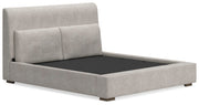 Ashley Furniture Cabalynn upholstered bed with a plush headboard and elegant design, shown from an angled view.