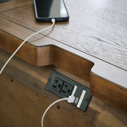 Ashley Furniture Cabalynn nightstand with USB ports, dark wood finish, featuring a modern design and storage drawer.
