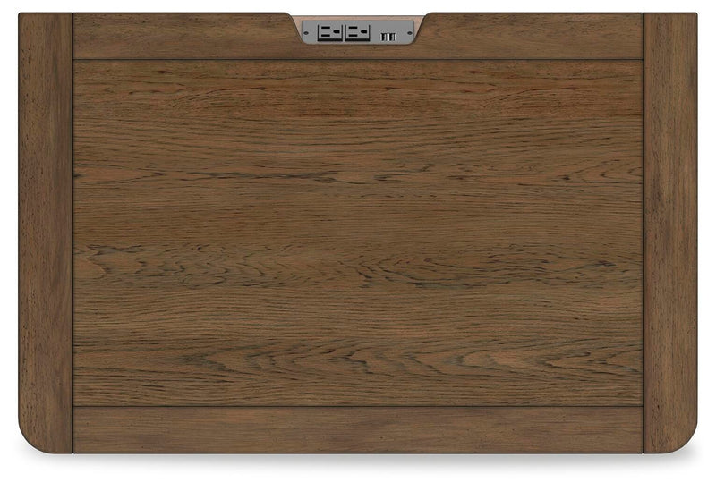 Ashley Furniture Cabalynn nightstand with a dark wood finish and sleek top surface, featuring modern design and drawer storage.