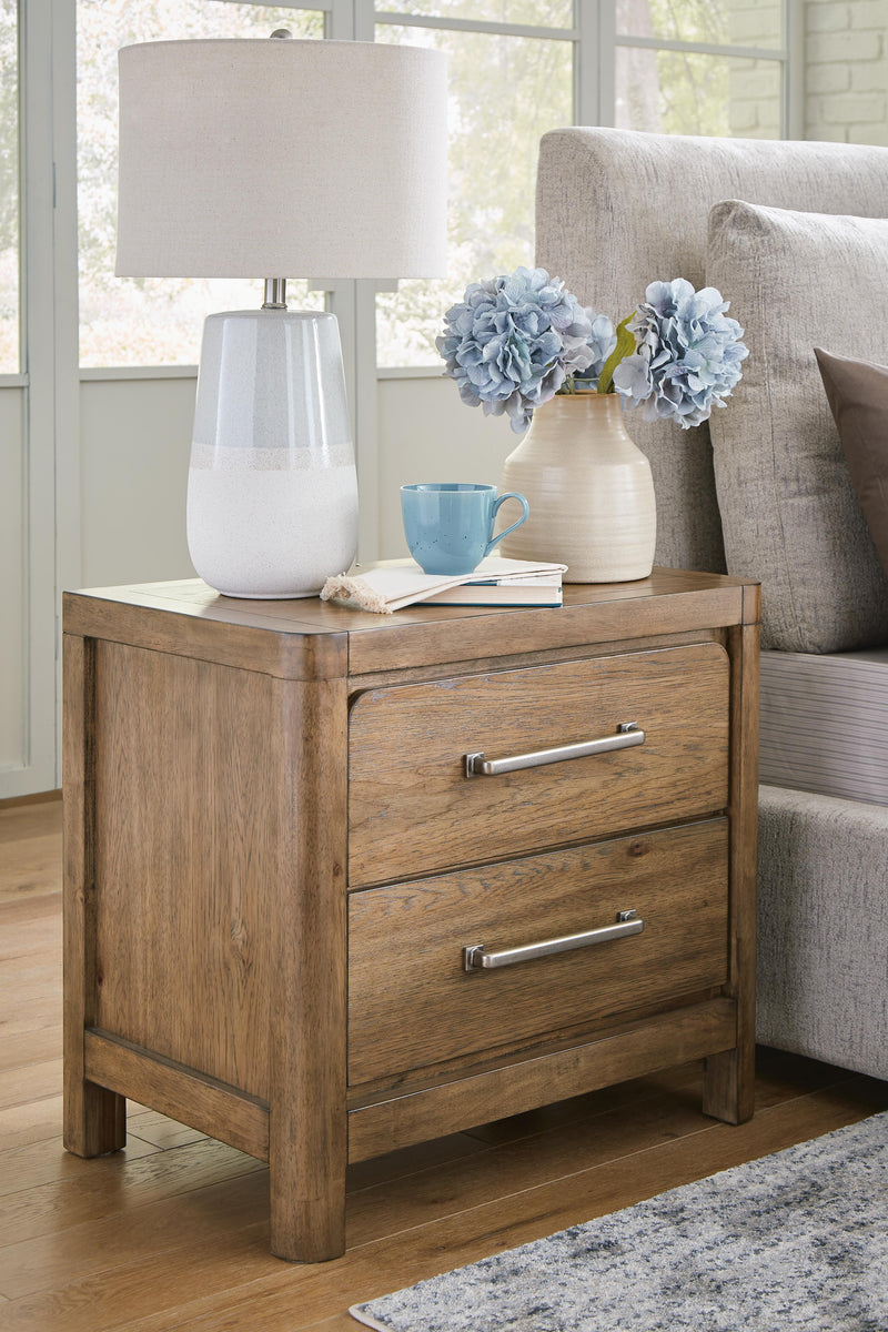 Ashley Furniture Cabalynn nightstand with a sleek wood finish and modern design, featuring a drawer and open shelf.