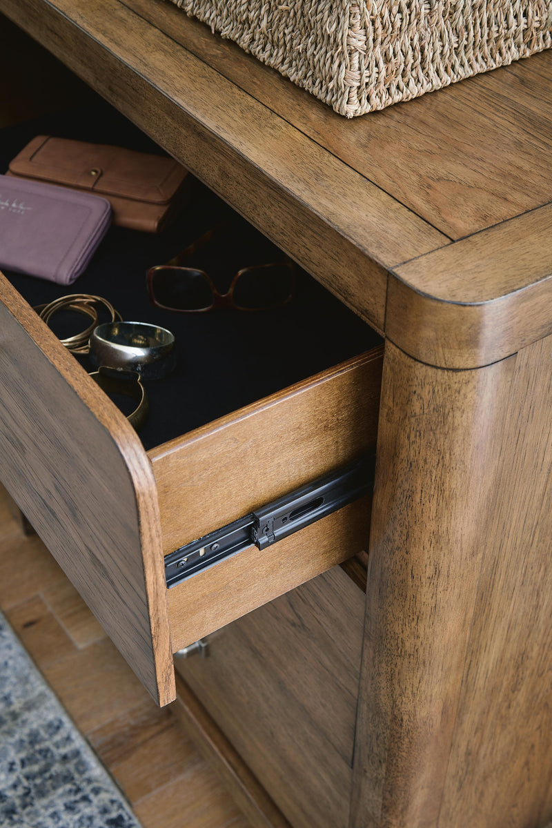 Ashley Furniture Cabalynn Dresser with sleek wood finish and multiple drawers for stylish bedroom storage.