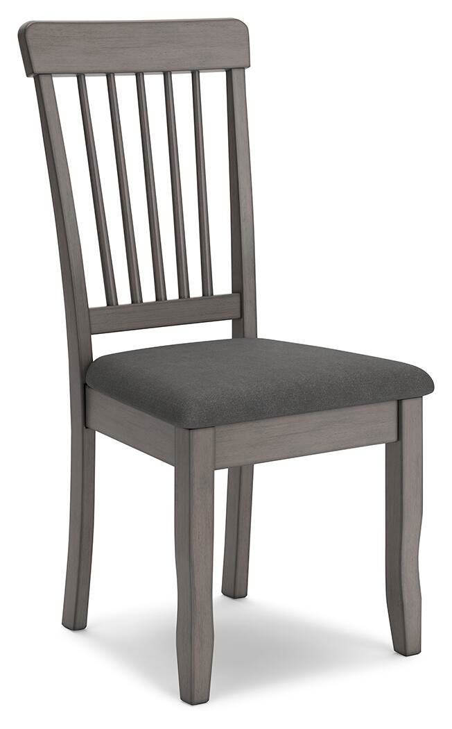 Ashley Furniture Shullden dining room set with a wooden table and matching chairs, shown from an angled view.
