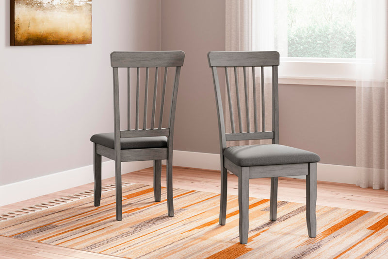 Ashley Furniture Shullden dining room set with a wooden table and matching chairs, ideal for modern dining spaces.