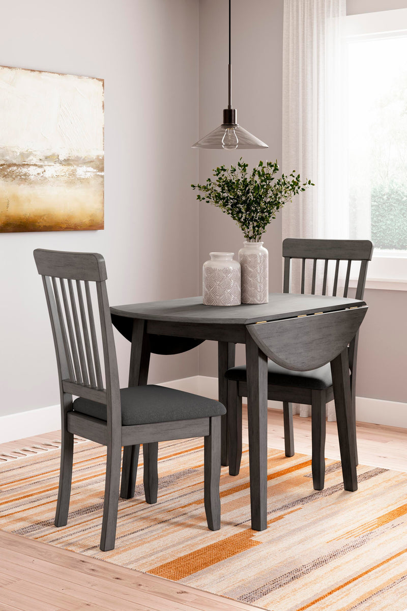 Ashley Furniture Shullden dining room set with a table and six upholstered chairs in a modern design.
