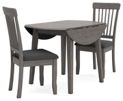 Ashley Furniture Shullden dining room set with a wooden table and six matching chairs in a modern design.