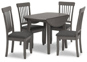 Ashley Furniture Shullden dining room set featuring a wooden table with six matching chairs in a modern design.