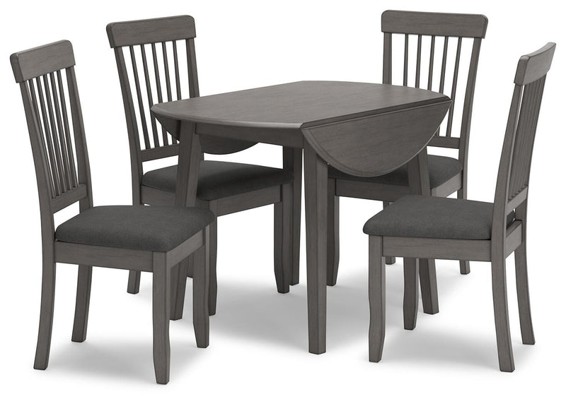 Ashley Furniture Shullden dining room set featuring a wooden table with six matching chairs in a modern design.