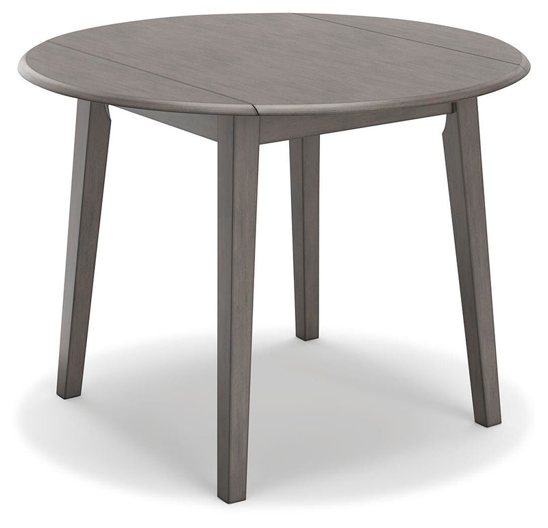 Ashley Furniture Shullden dining room set with a table and matching chairs, viewed from an angle in a modern dining space.