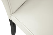 Ashley Furniture Kimonte dining chair with dark wood finish and upholstered seat, shown from a detail shot.