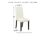 Ashley Furniture Kimonte dining chair with dark wood legs and beige upholstered seat, shown from a side angle.
