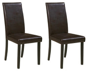 Ashley Furniture Kimonte dining chair set featuring upholstered seats and wooden legs, arranged around a dining table.