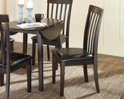 Ashley Furniture Hammis dining chair with upholstered seat and wooden legs, shown from a front angle.